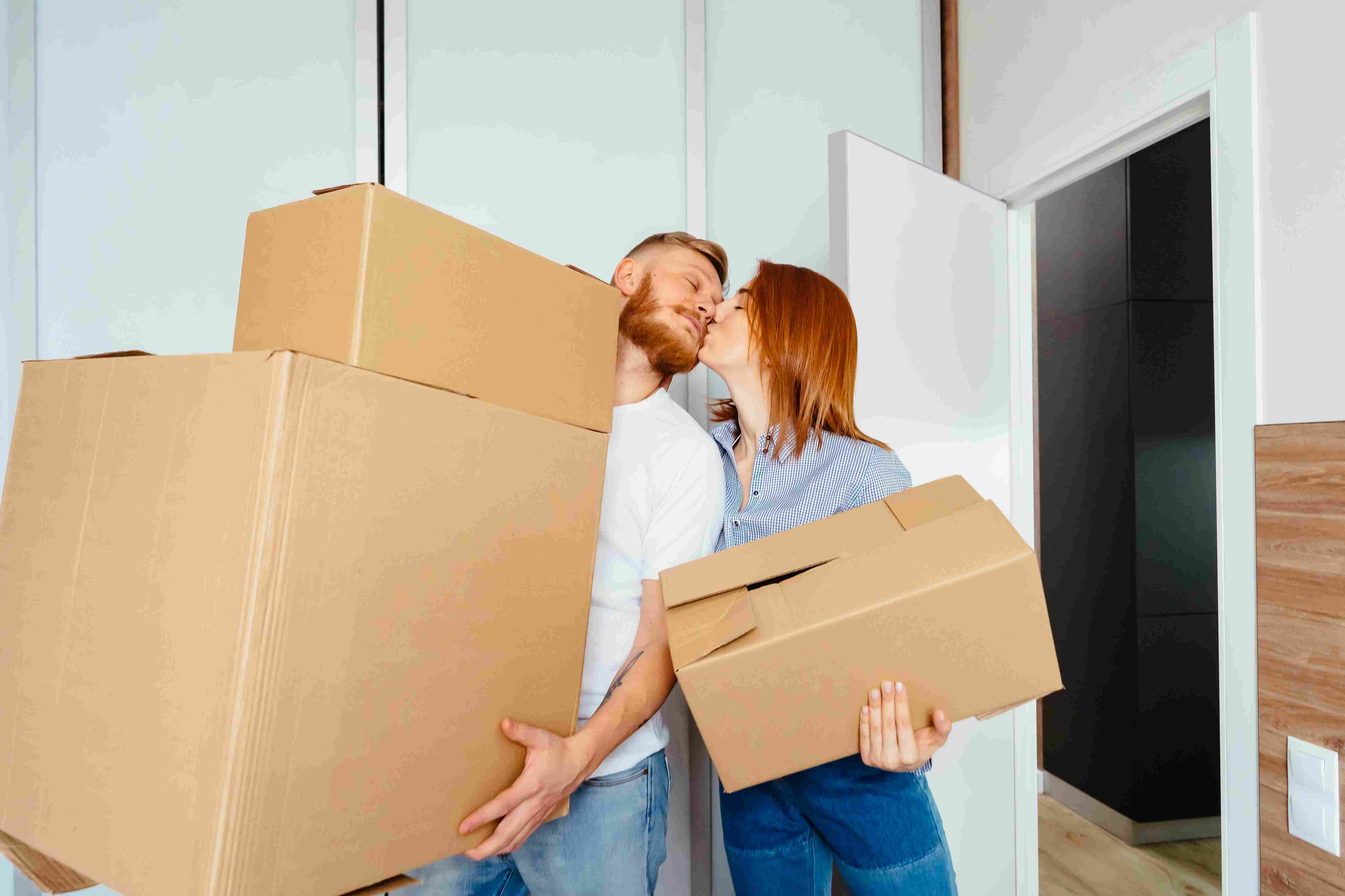 Friendly moving coordinator speaking with client